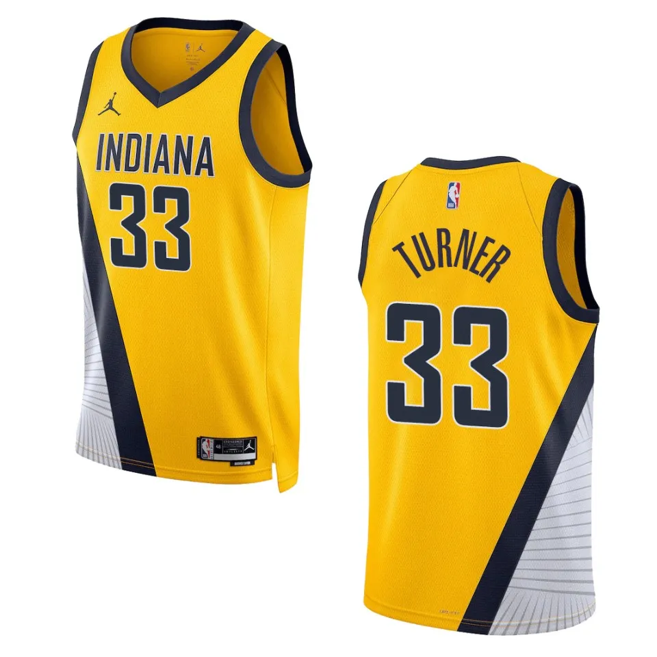 myles-turner-2022-23-statement-edition-swingman-yellow-jersey.webp